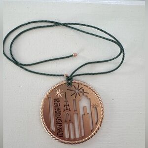 David Yurman Bronze Cityscape Pendant with Green Cord